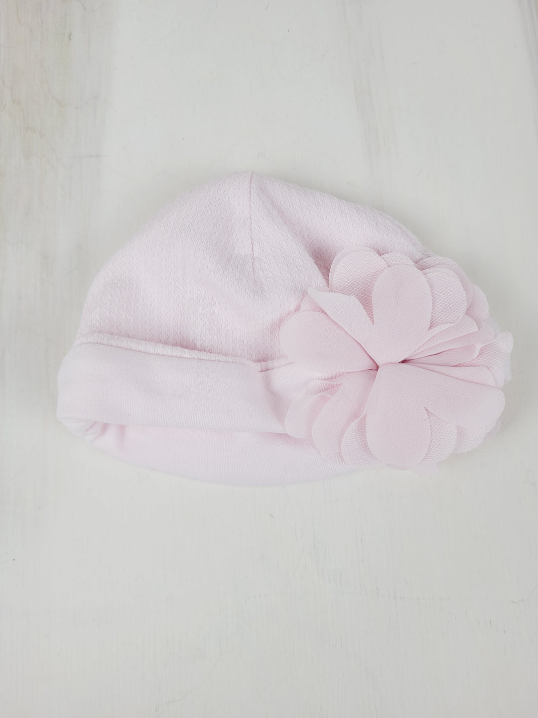 PINK CRIB BEANIE WITH FLOWER 6M PRE-LOVED
