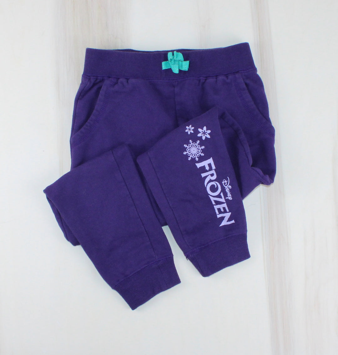 DISNEY FROZEN PURPLE TRACK PANTS 5Y PRE-LOVED