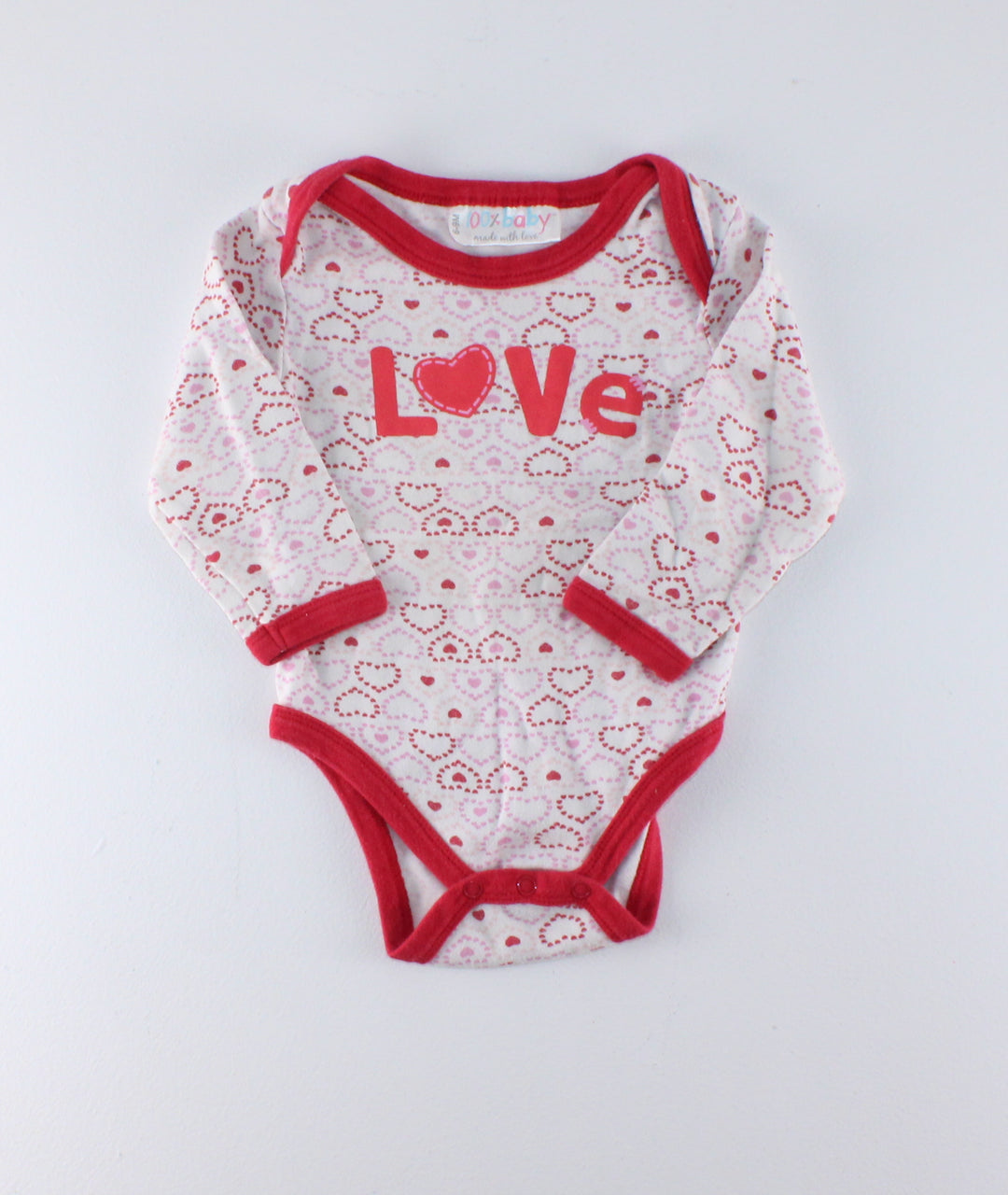 LOVE ONESIE 6-9M PRE-LOVED