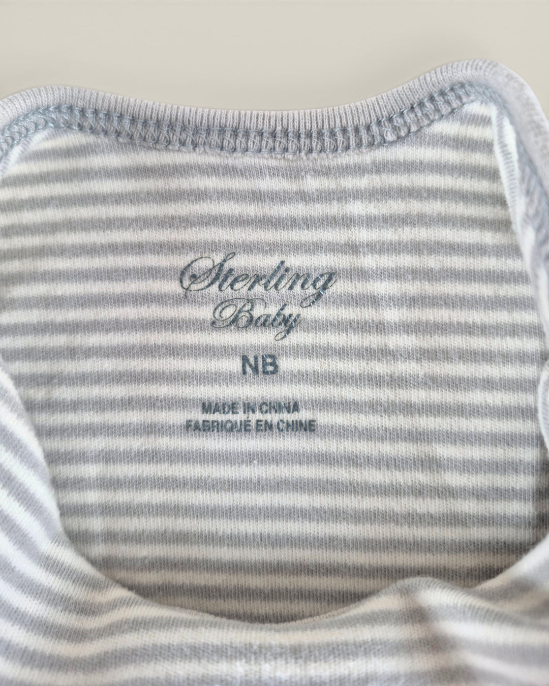 Pre-Loved Sterling Baby Striped Onesie NB | Betty’s Marketplace
