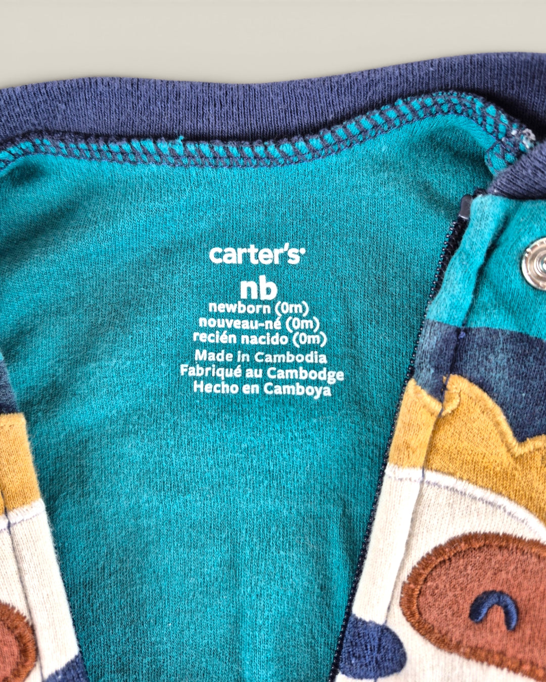 Pre-Loved Carter's Striped Sloth Footies NB | Betty’s Marketplace